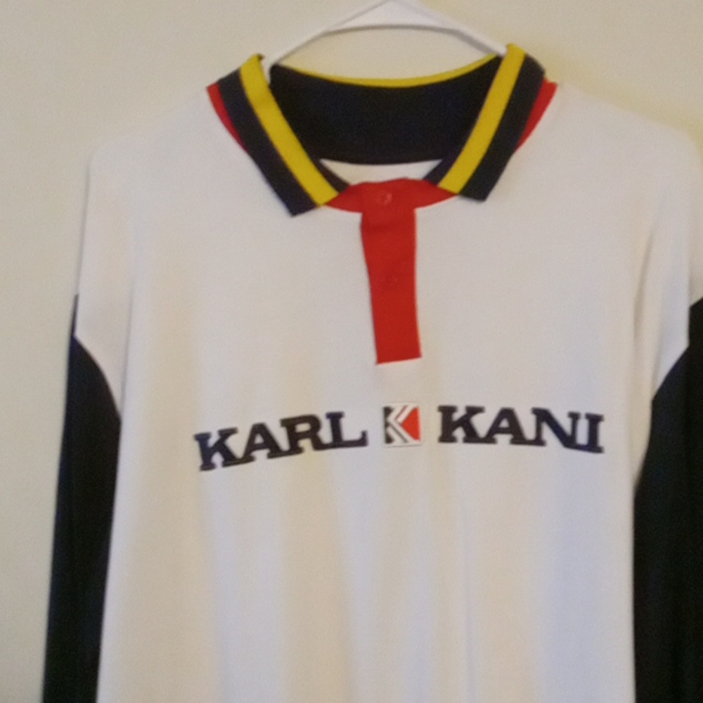 Long sleeve Polo by Karl Kani..size large. White with red, yellow and navy blue.